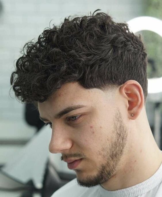 Low Taper Fade Curly Hair White Male