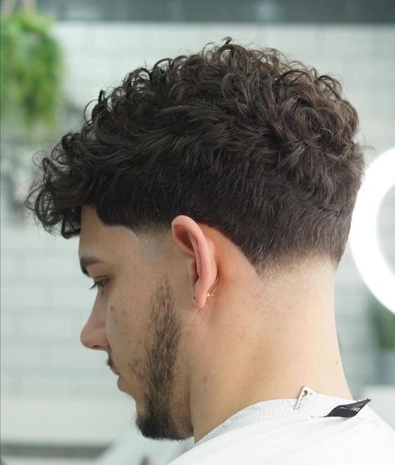 Low Taper Fade Curly Hair White Male